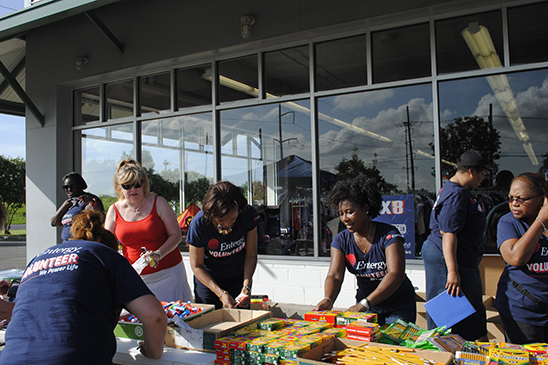 Employees work alongside the Salvation Army to Stuff the Bus